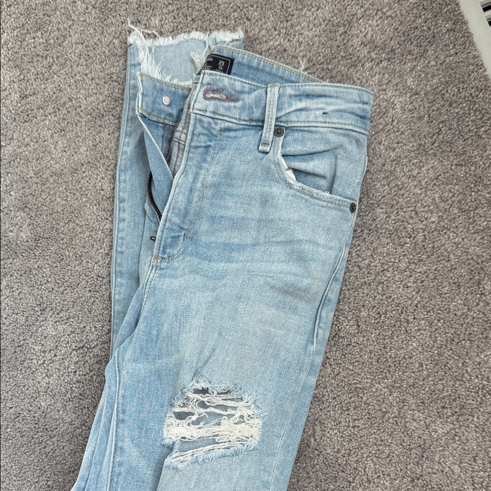 Light wash ripped Abercrombie skinny jeans